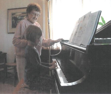 Mildred with piano pupil - 2