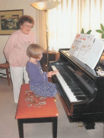 Mildred with piano pupil